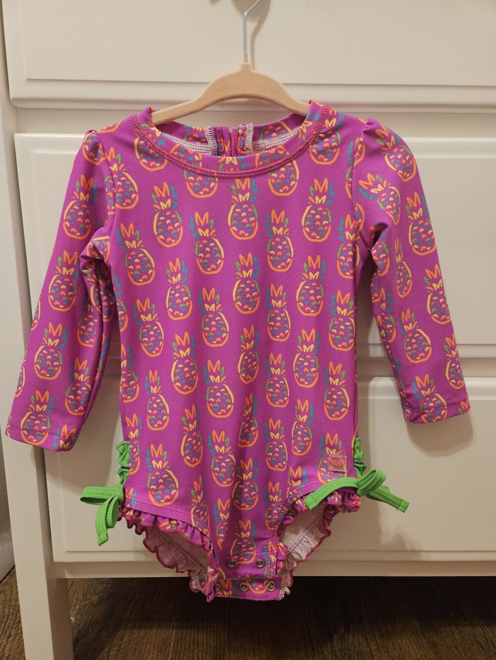 Ruffle Butts Neon Violet Pineapple Rashguard One Piece Swimsuit- Size 18-24m